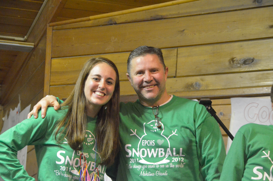 Ray Schellenberger with a student, both wearing green EPCHS Snowball 2011-2012 shirts