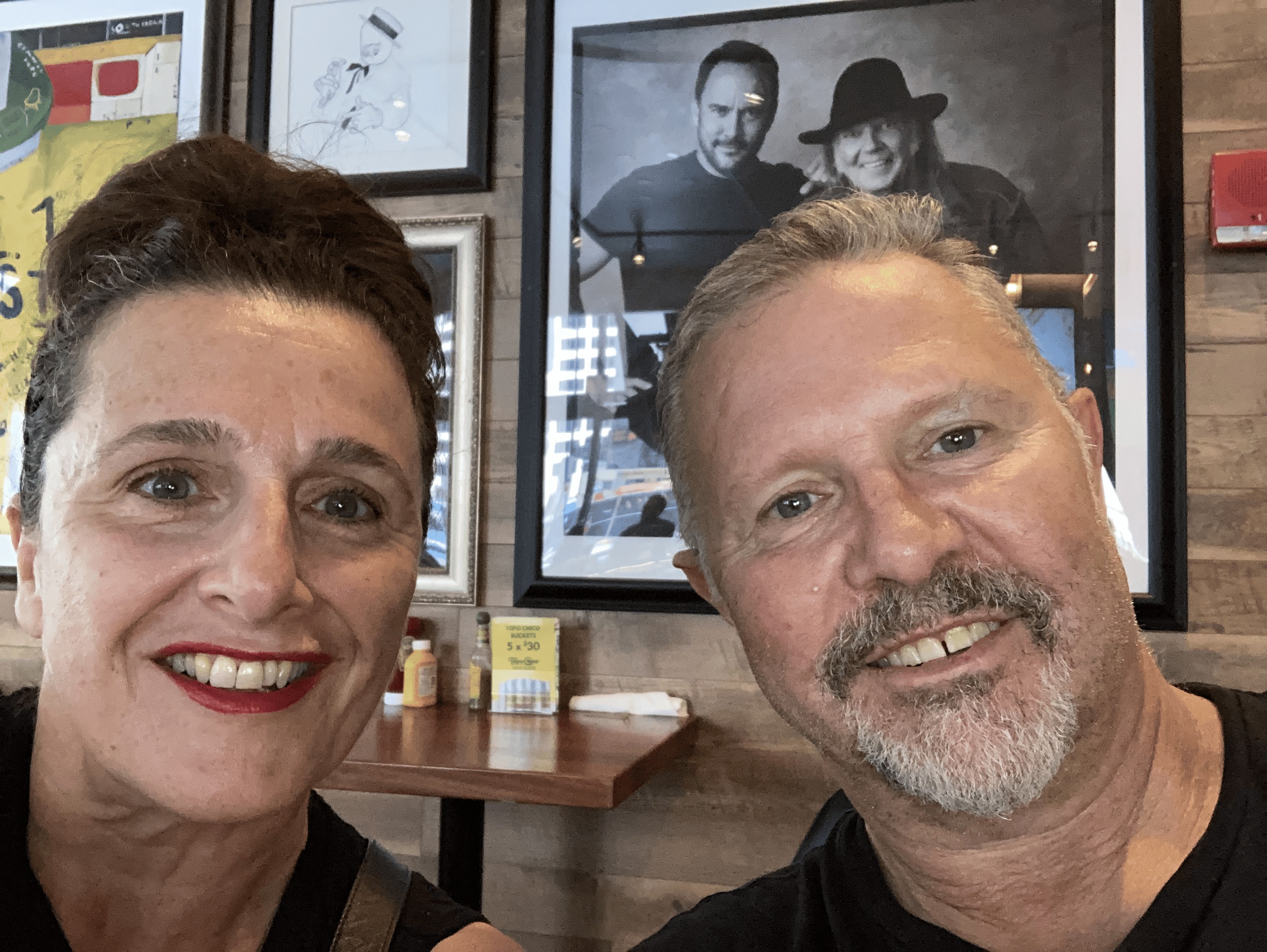 Ray Schellenberger sharing a warm smile in a selfie with a friend at a restaurant